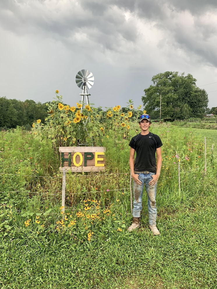 Ryan in front of Hope garden