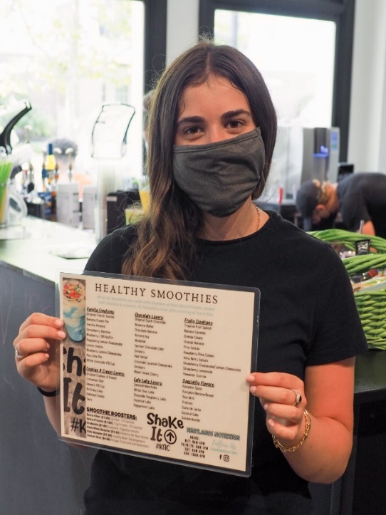 Shown above is Emma posing with a menu Kentland’s nutrition.